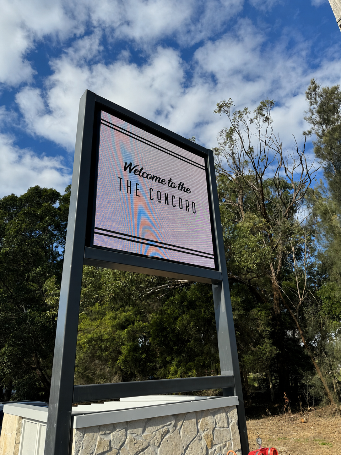 The finished external digital sign providing clear communication from arrival through to the main venue.