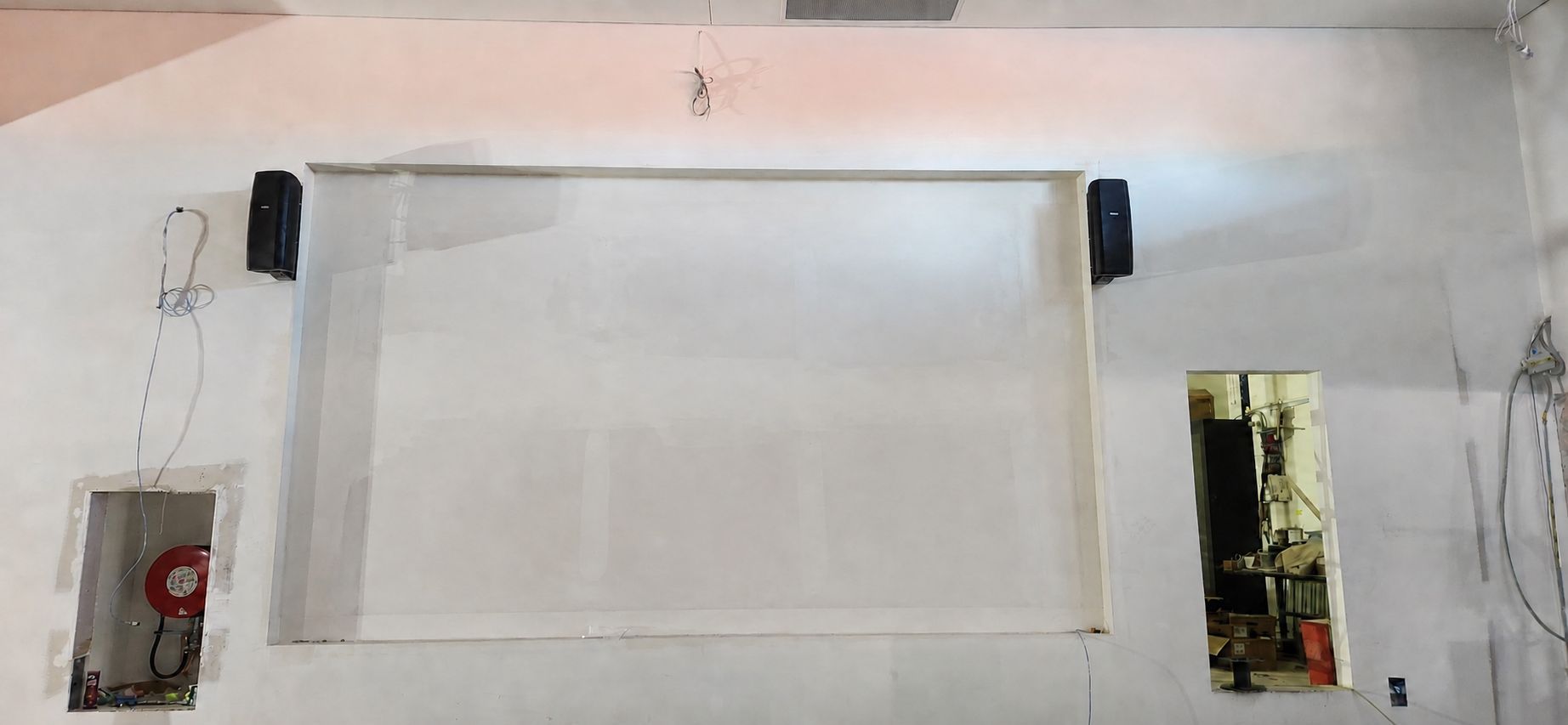 The sports bar screen location prepared and ready, immediately before the LED wall installation began.